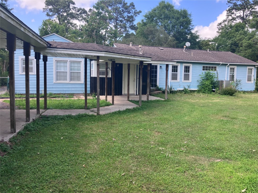 5012 Winding Way Dickinson, TX 77539 - Photo 3 of 23 a view of a house with a yard and porch