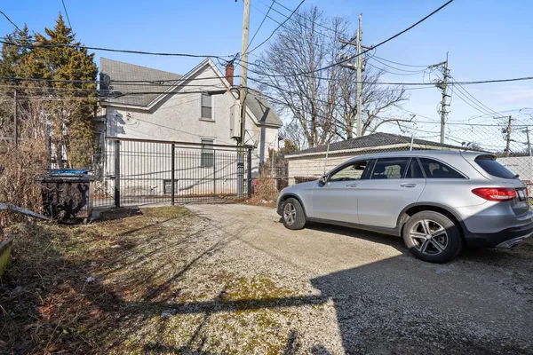 a view of a car in front of a house