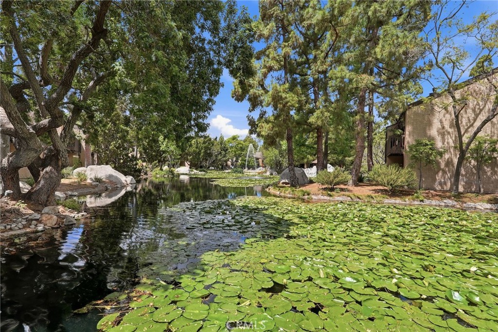 7890 East Spring Street, Unit 2L Long Beach, CA 90815 - Photo 39 of 47 a view of yard with green space