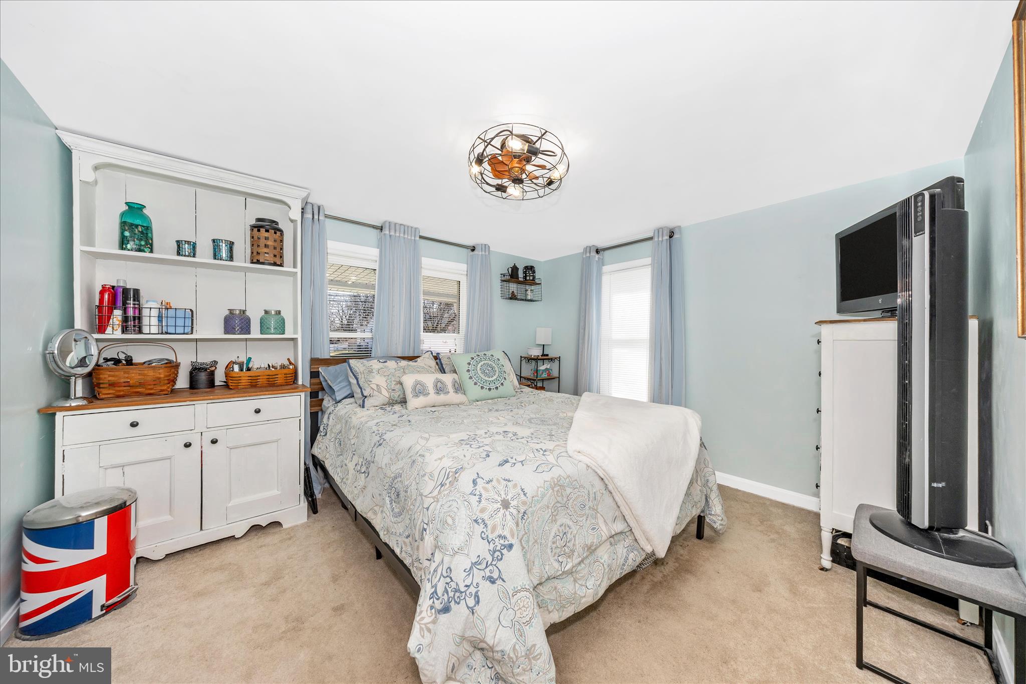 5618 Bartonsville Road Frederick, MD 21704 - Photo 16 of 53 a spacious bedroom with a bed and a flat screen tv