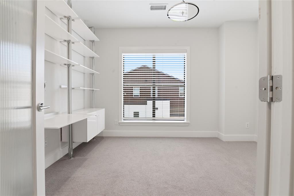 4211 Rawlins Street, Unit 530 Dallas, TX 75219 - Photo 23 of 33 a view of empty room with windows