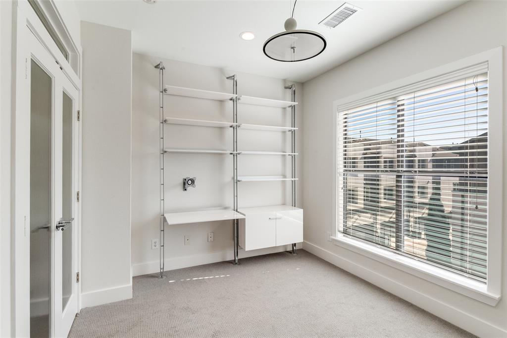 4211 Rawlins Street, Unit 530 Dallas, TX 75219 - Photo 24 of 33 a view of a livingroom with furniture and a window