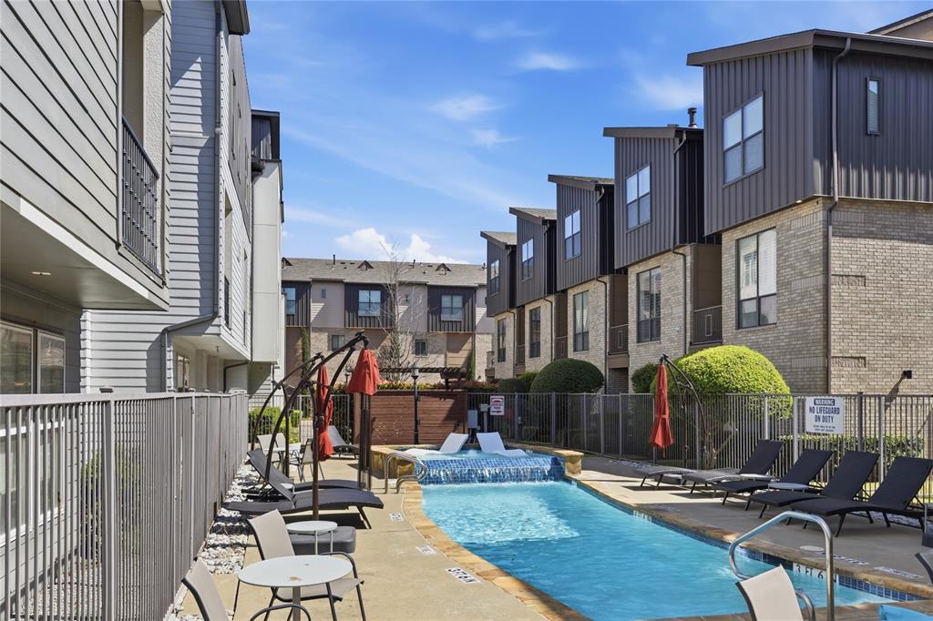 4211 Rawlins Street, Unit 530 Dallas, TX 75219 - Photo 25 of 33 a view of a building with sitting area