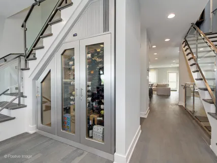 a view of an entryway with wooden floor