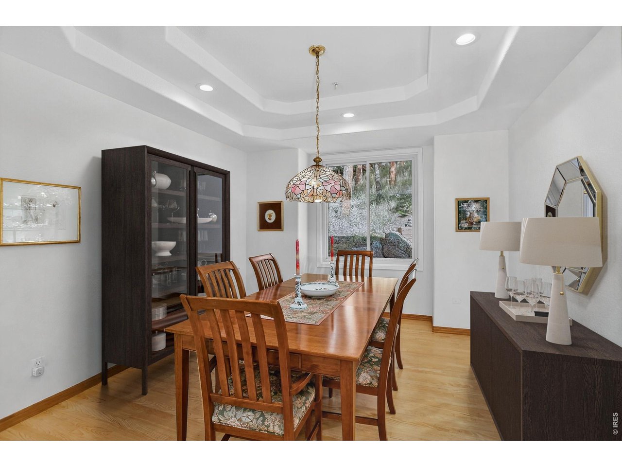 65 Betasso Road Boulder, CO 80302 - Photo 18 of 38 a dining room with furniture a chandelier and window
