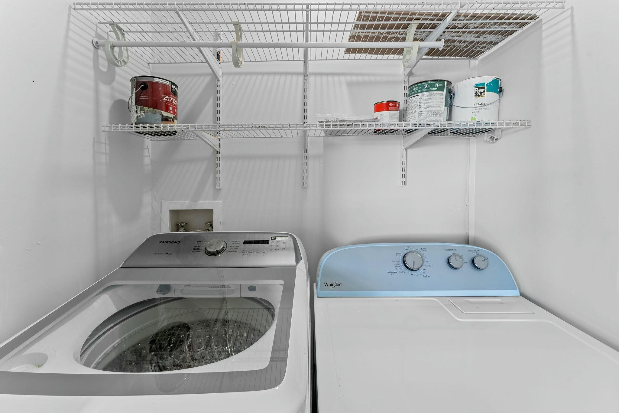 23032 Island View, Unit H Boca Raton, FL 33433 - Photo 24 of 30 a utility room with dryer and washer