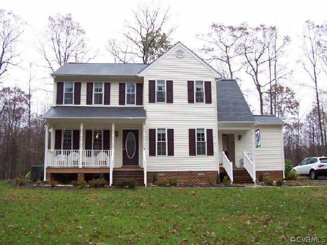 1964 Eastham Road Bumpass, VA 23024 - Photo 1 of 1 a view of a house with a yard