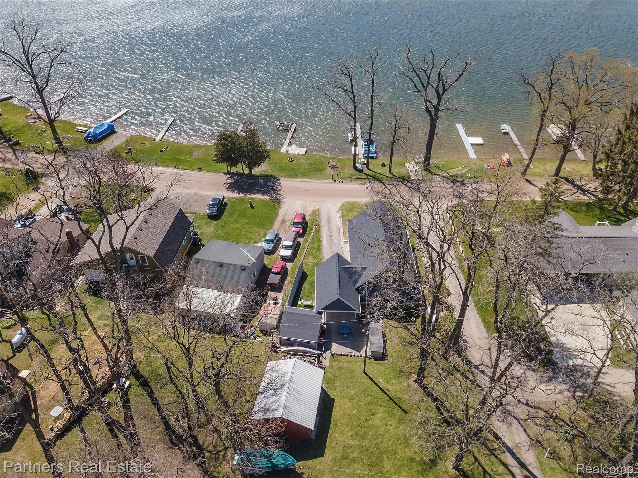 16051 Murray Road Byron, MI 48418 - Photo 40 of 41 Overhead view of the back of the home facing the lake.