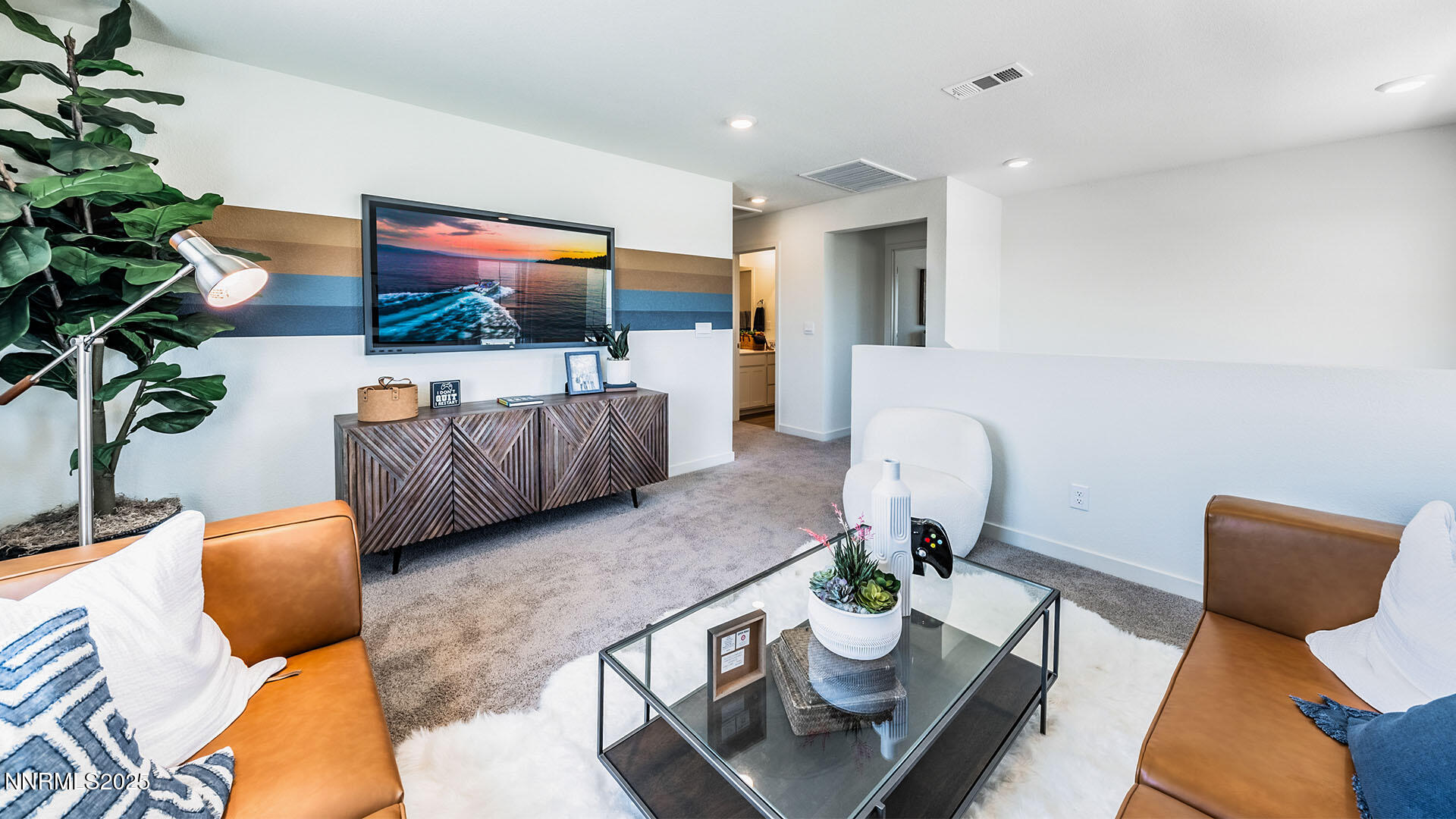616 Union Road, Unit LOT #66 Dayton, NV 89403 - Photo 12 of 25 a living room with furniture and a flat screen tv