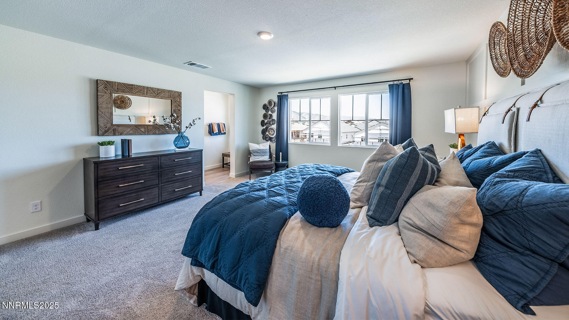 616 Union Road, Unit LOT #66 Dayton, NV 89403 - Photo 14 of 25 a bedroom with a bed and window