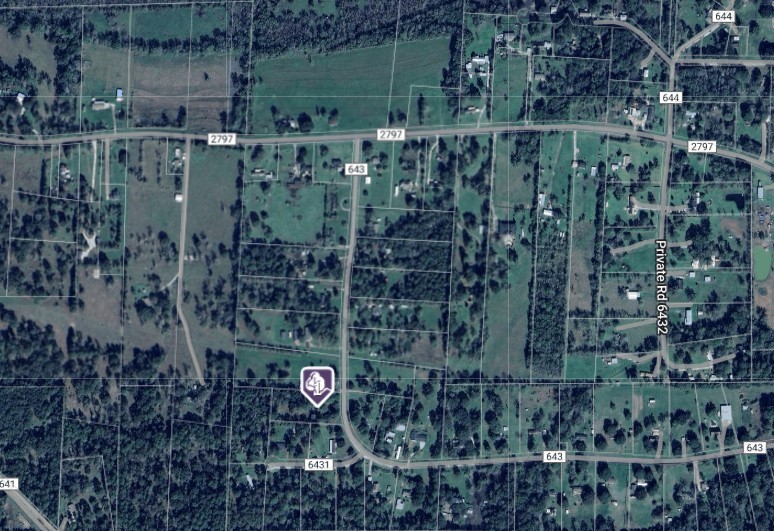 310 County Road 643 Kenefick, TX 77535 - Photo 13 of 13 a bathroom with a shower