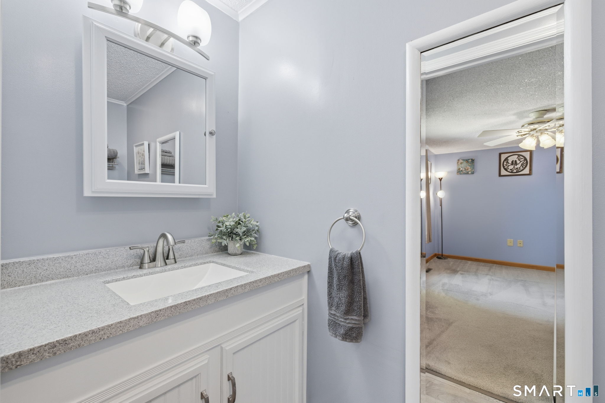 141 Hop River Road Coventry, CT 06238 - Photo 15 of 40 a bathroom with a sink and a mirror