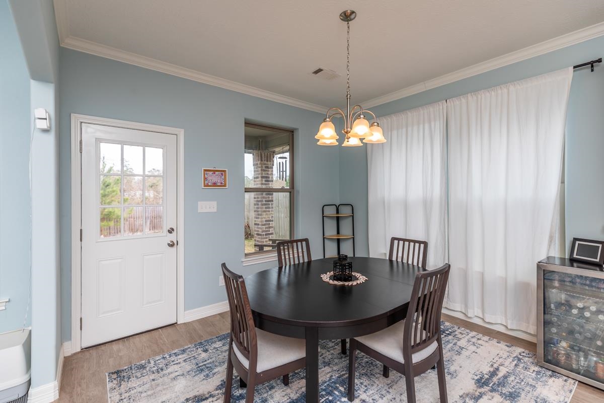 314 Long Leaf Street Silsbee, TX 77656 - Photo 12 of 31 a view of a dining room with furniture and window