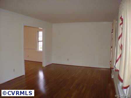 1930 Albion Road Midlothian, VA 23113 - Photo 5 of 10 a view of an empty room with a window