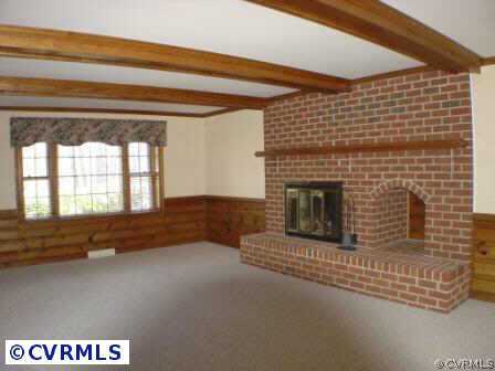 1930 Albion Road Midlothian, VA 23113 - Photo 8 of 10 a view of an empty room with a fireplace and a window