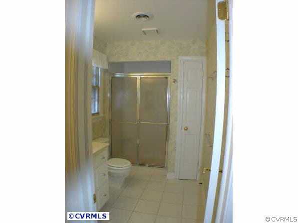 1930 Albion Road Midlothian, VA 23113 - Photo 10 of 10 a bathroom with a shower and a toilet