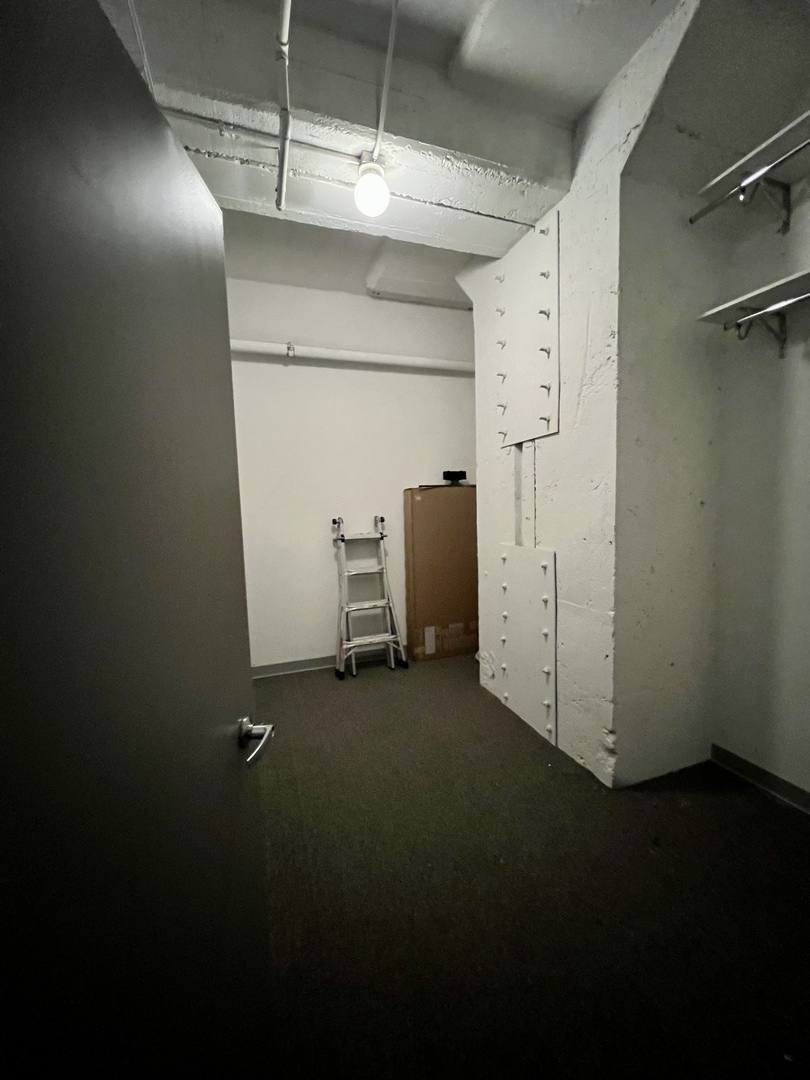 565 West Quincy Street, Unit 717 Chicago, IL 60661 - Photo 34 of 37 a view of a room with utility room