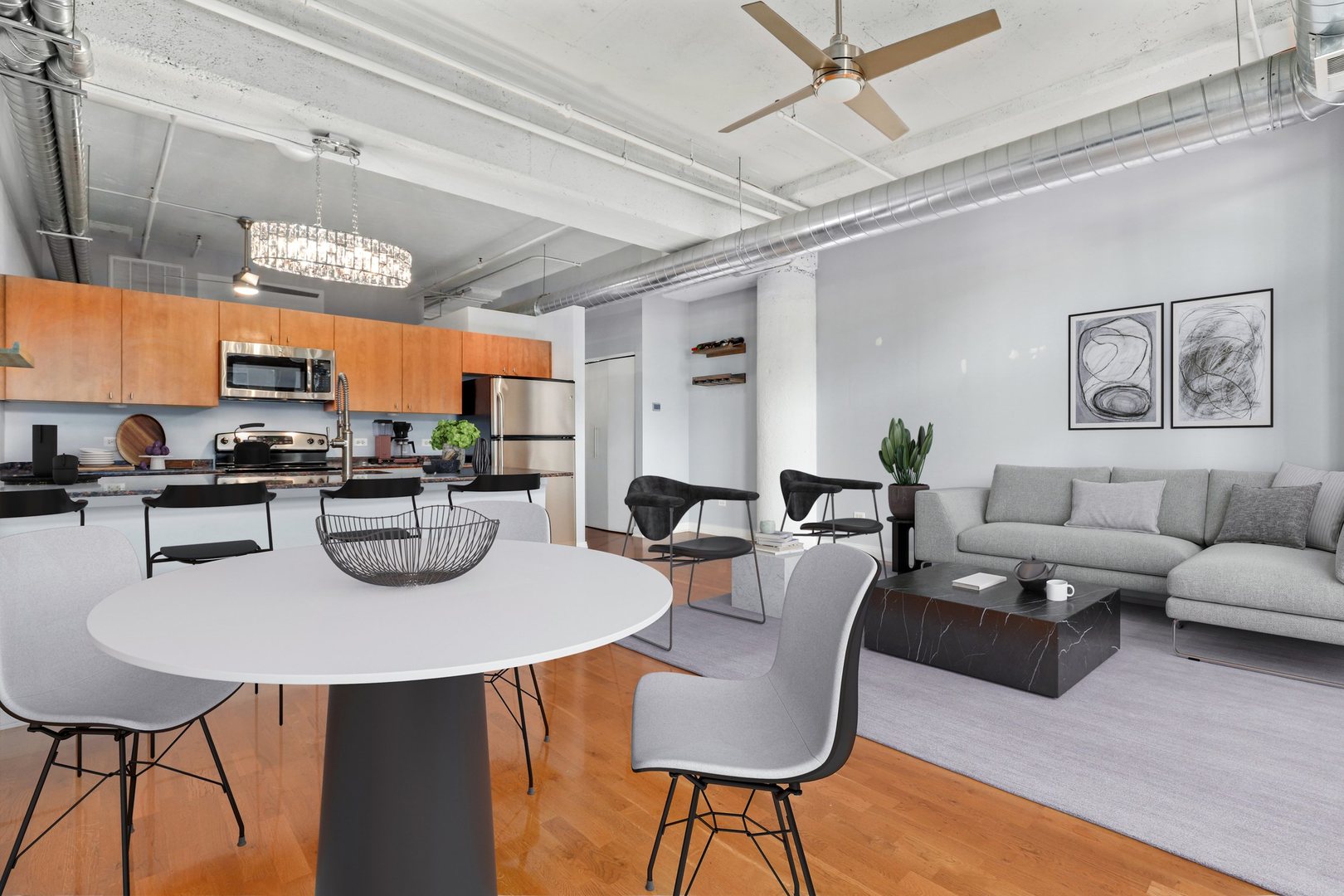 565 West Quincy Street, Unit 717 Chicago, IL 60661 - Photo 9 of 37 a view of a dining room with furniture