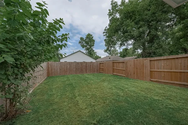 a view of an house that has garden