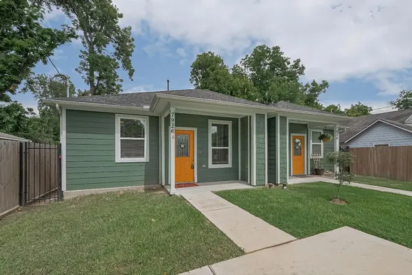 front view of a house and a yard