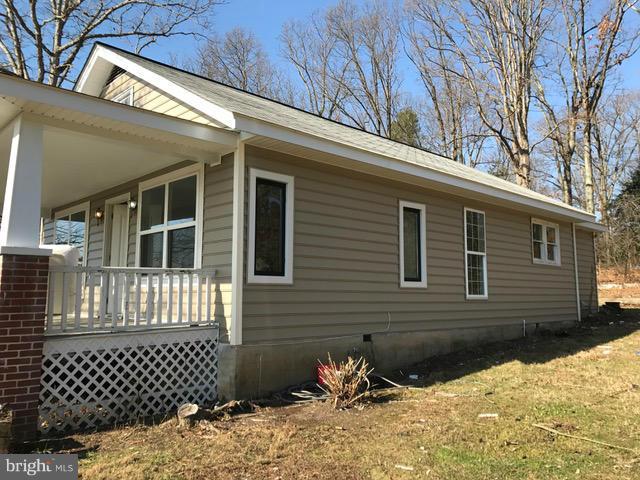 223 Forest Lane Road Fredericksburg, VA 22405 - Photo 3 of 15 a view of a house with a yard