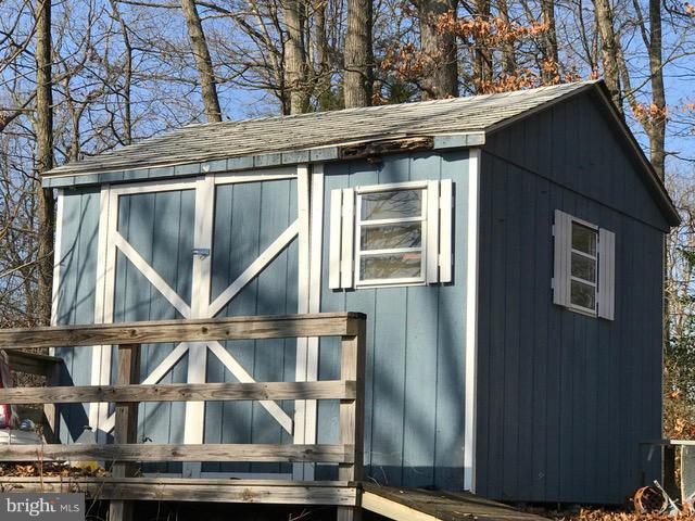 223 Forest Lane Road Fredericksburg, VA 22405 - Photo 5 of 15 a front view of a house with street