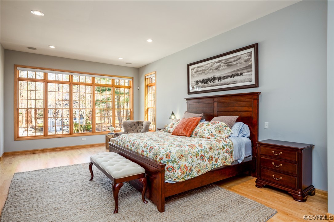 124 West Lancashire Williamsburg, VA 23188 - Photo 22 of 44 a bedroom with a bed and a large window