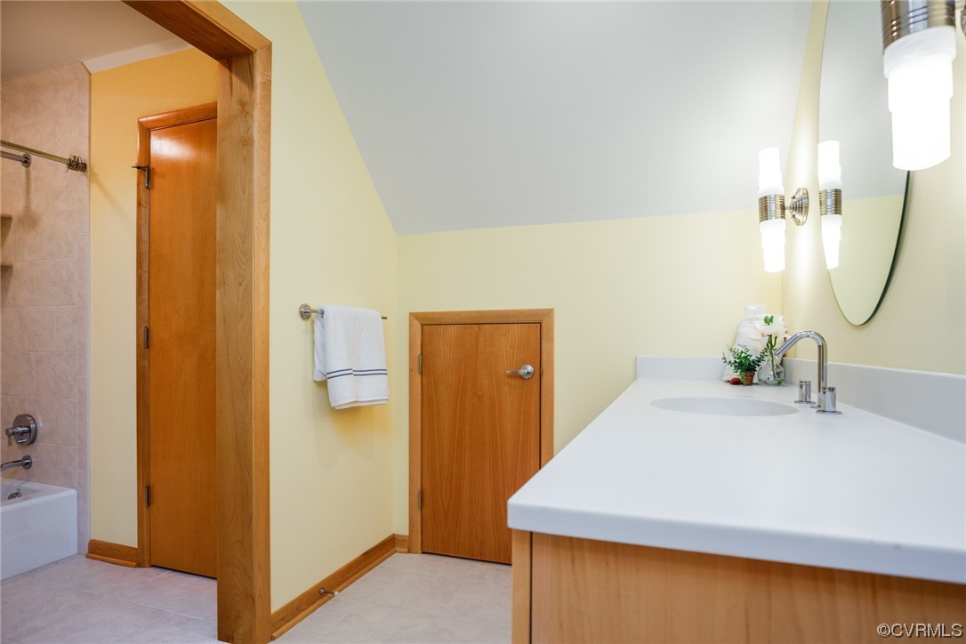 124 West Lancashire Williamsburg, VA 23188 - Photo 28 of 44 a en suite bathroom with a sink and mirror