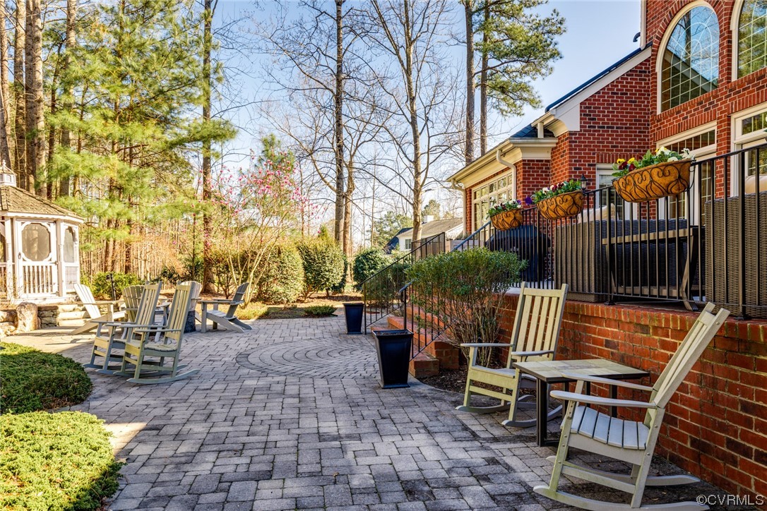 124 West Lancashire Williamsburg, VA 23188 - Photo 33 of 44 a view of a patio with iron fence