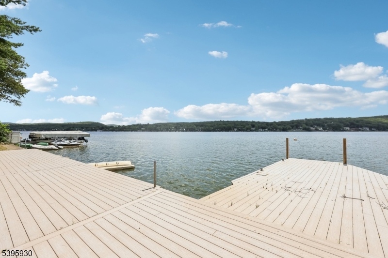 12 Rocky Point Road West Milford, NJ 07421 - Photo 37 of 50 a view of a lake and mountain