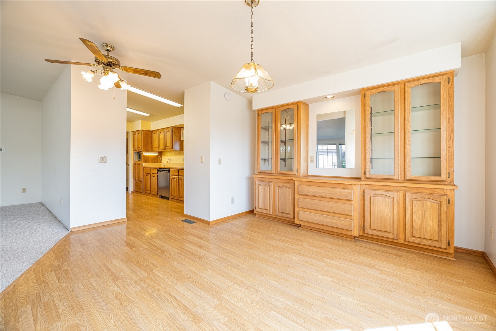 3802 James Street, Unit 82 Bellingham, WA 98226 - Photo 11 of 29 a view of an empty room with cabinet and a ceiling fan