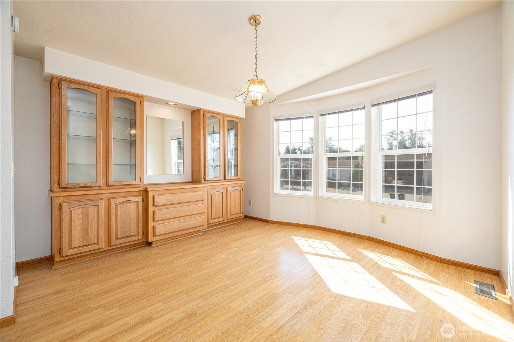 3802 James Street, Unit 82 Bellingham, WA 98226 - Photo 12 of 29 a view of an empty room with window and wooden floor