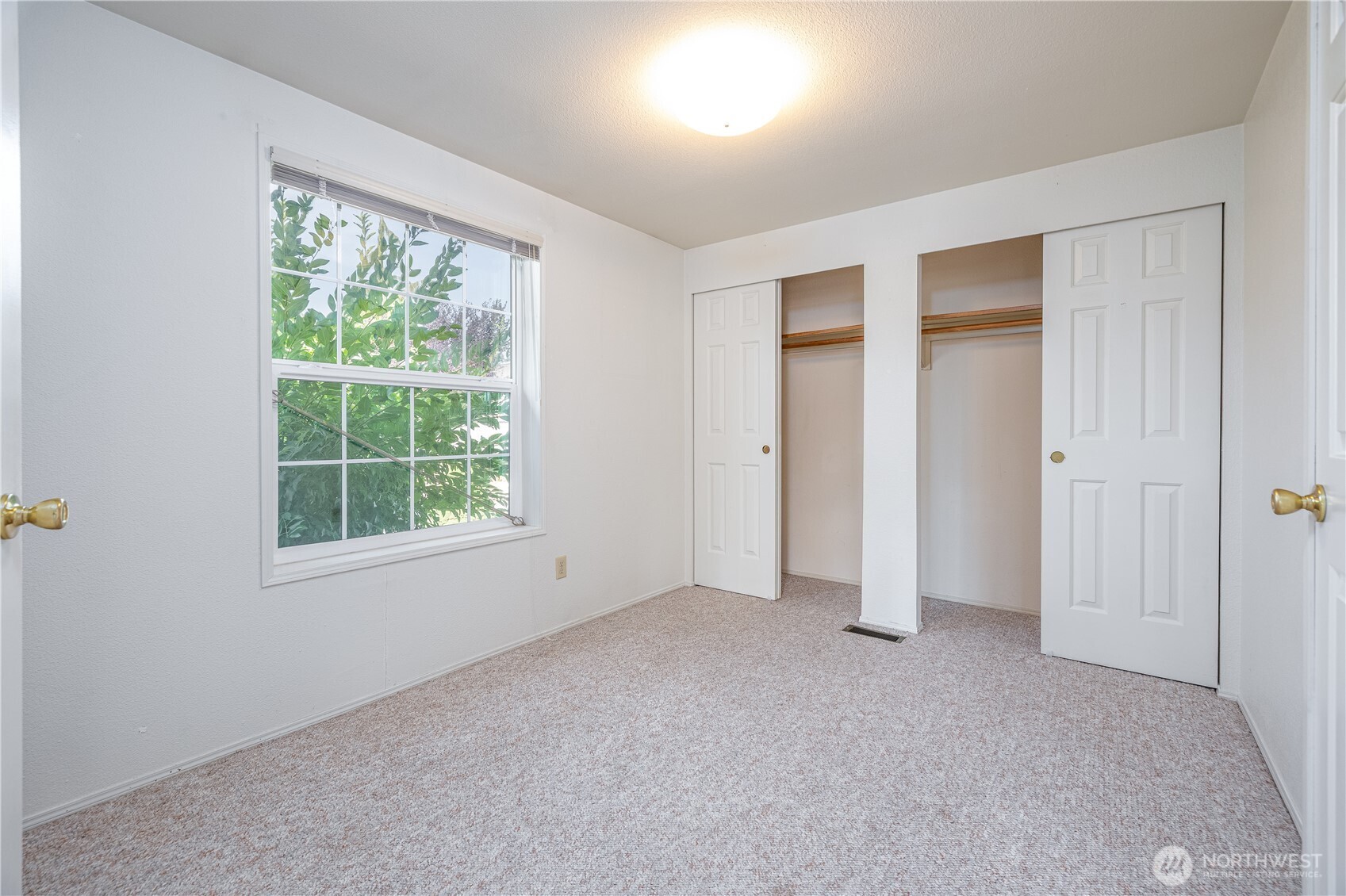 3802 James Street, Unit 82 Bellingham, WA 98226 - Photo 18 of 29 an empty room with a window and a livingroom