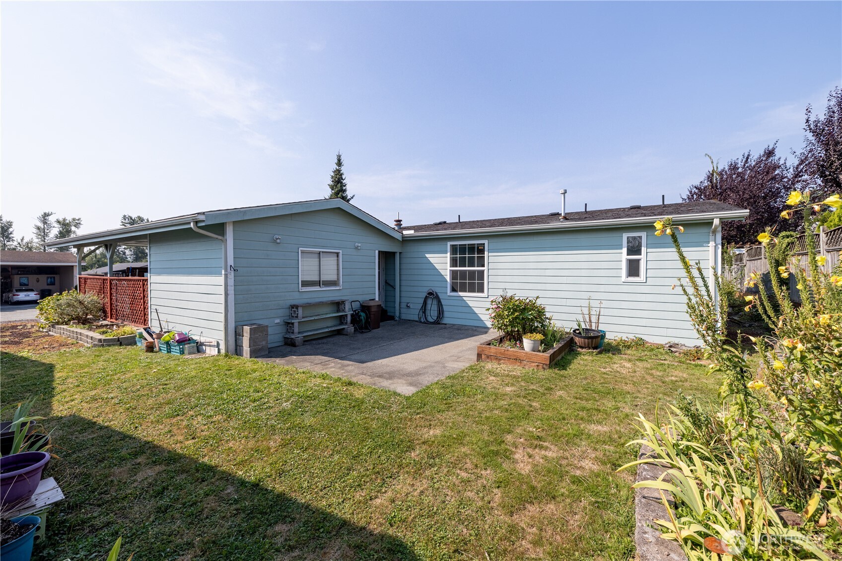 3802 James Street, Unit 82 Bellingham, WA 98226 - Photo 5 of 29 a view of a house with backyard and sitting area