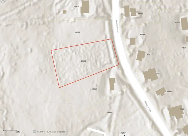 a view of a living room and kitchen