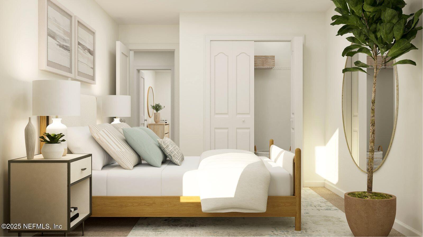 47 Bluegrass Way St. Augustine, FL 32092 - Photo 8 of 27 a bedroom with a bed and a potted plant