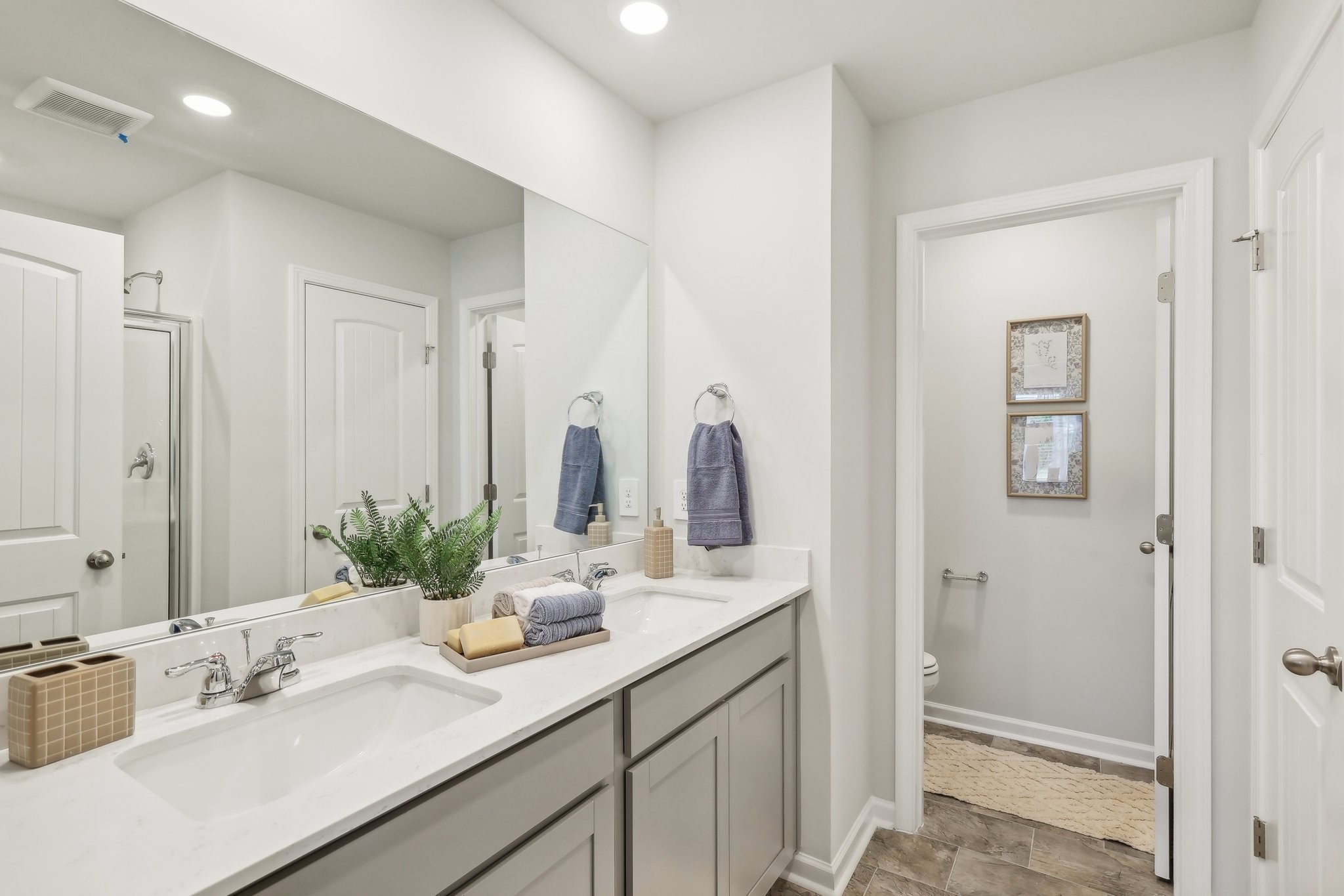 901 Highfield Way Lebanon, TN 37087 - Photo 20 of 29 a bathroom with a sink double vanity and a mirror