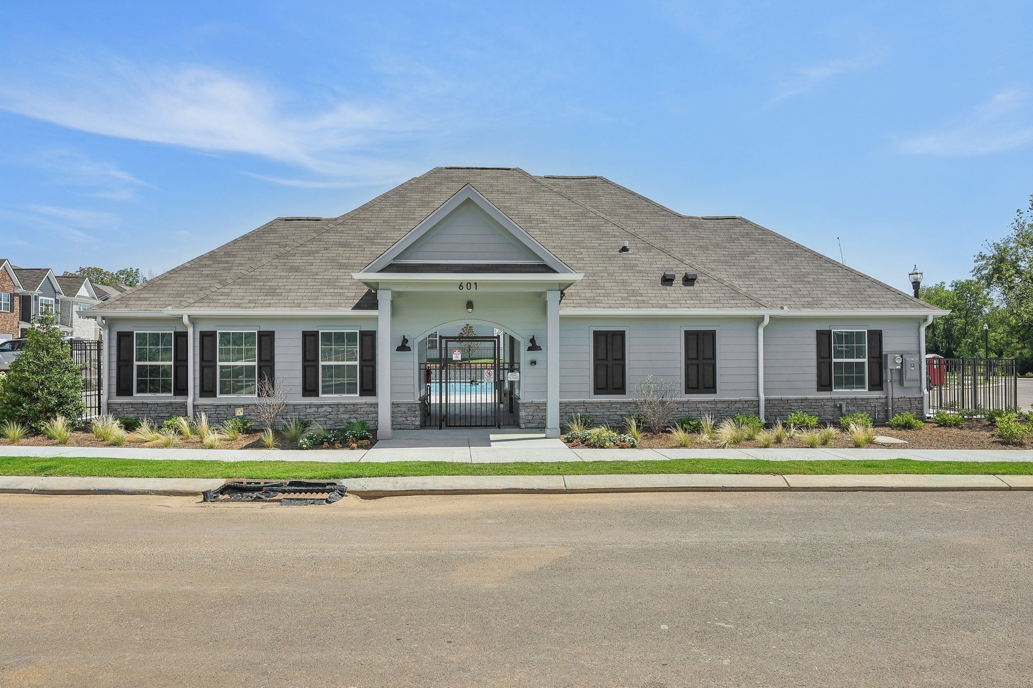 901 Highfield Way Lebanon, TN 37087 - Photo 29 of 29 a front view of a house with a garden and trees