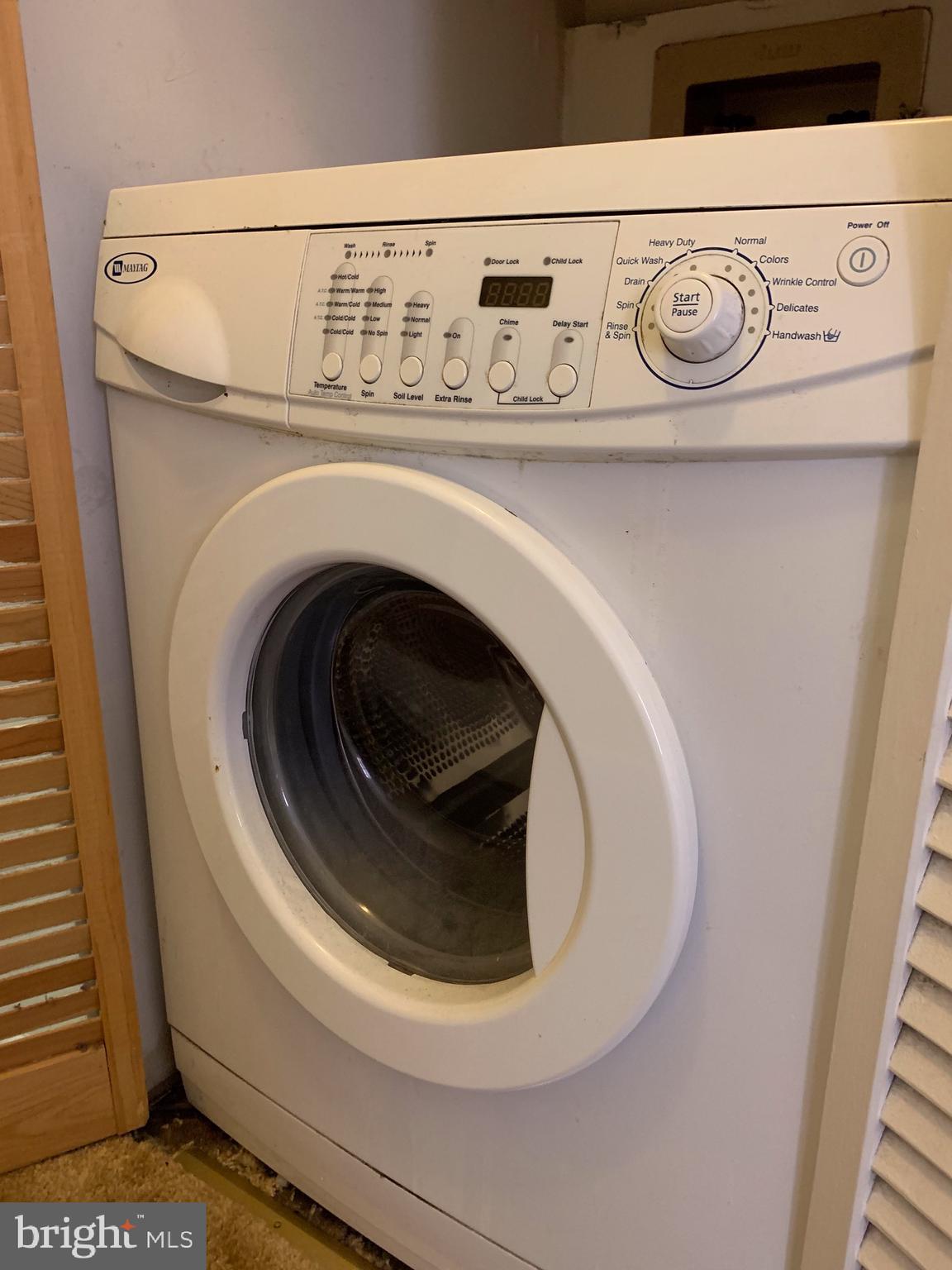1203 Locust Street, Unit 2F Philadelphia, PA 19107 - Photo 7 of 15 a utility room with dryer and washer