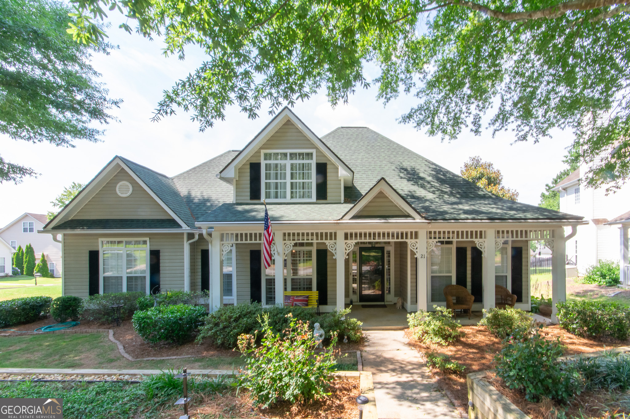21 High Point Circle Newnan, GA 30265 - Photo 1 of 1 a front view of a house with garden