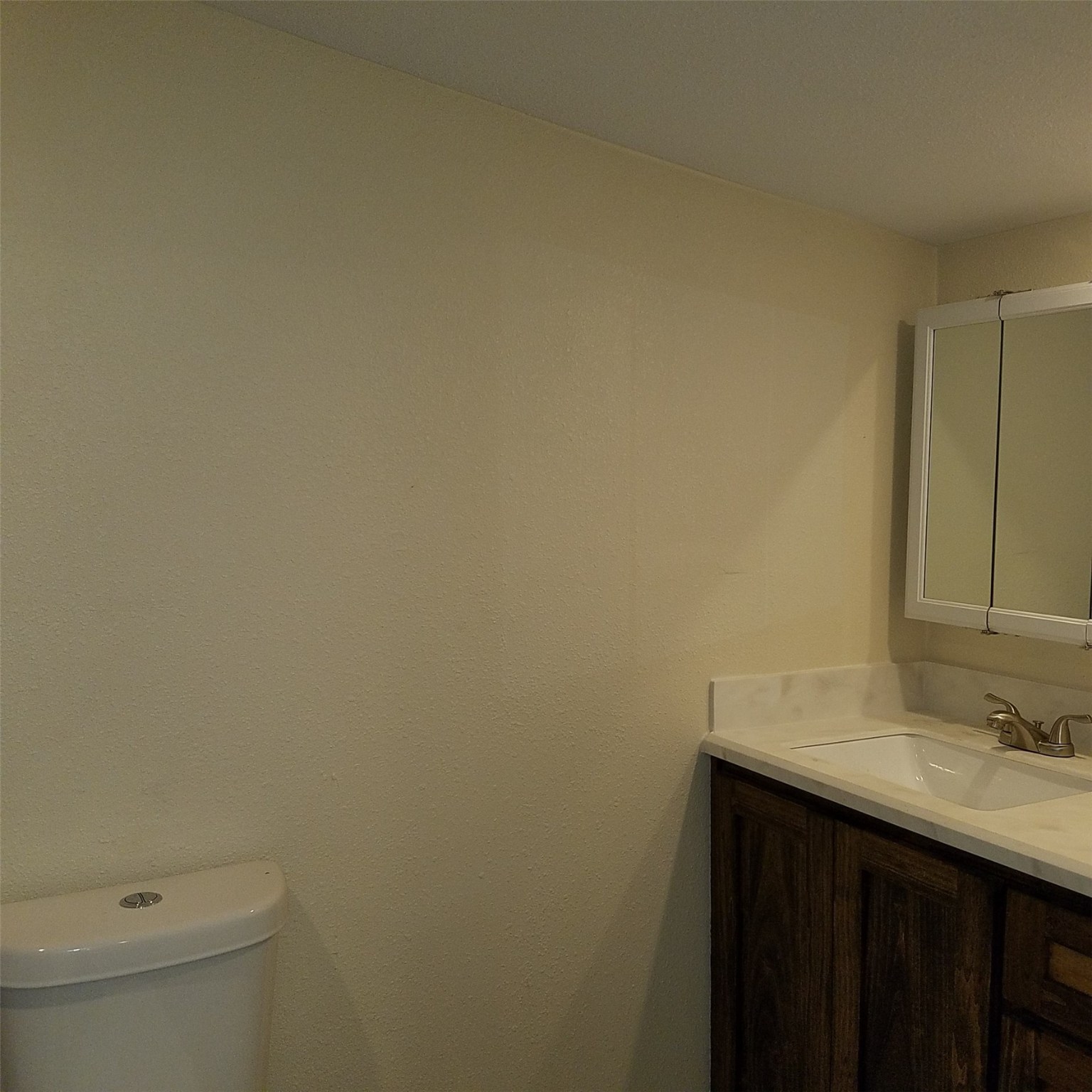 1503-2 Spur 529 Rosenberg, TX 77471 - Photo 7 of 10 a bathroom with a sink and a toilet
