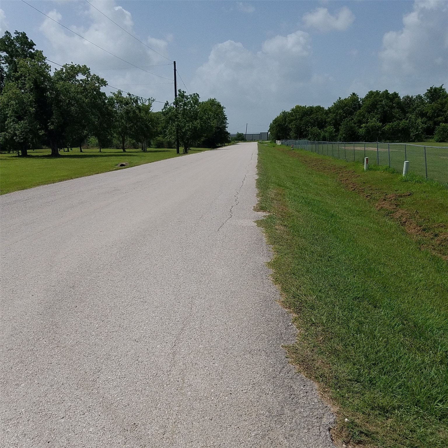 1503-2 Spur 529 Rosenberg, TX 77471 - Photo 9 of 10 a view of a golf course with a lake