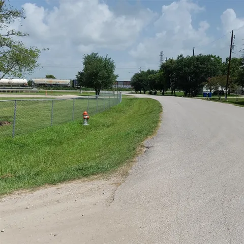a view of a golf course with a lake