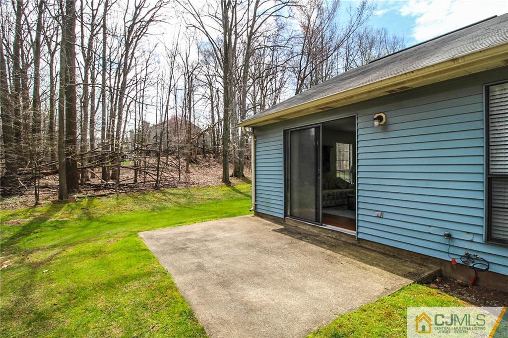2106 Timber Oaks Road, Unit 2106 Edison, NJ 08820 - Photo 25 of 25 a view of a back yard of the house