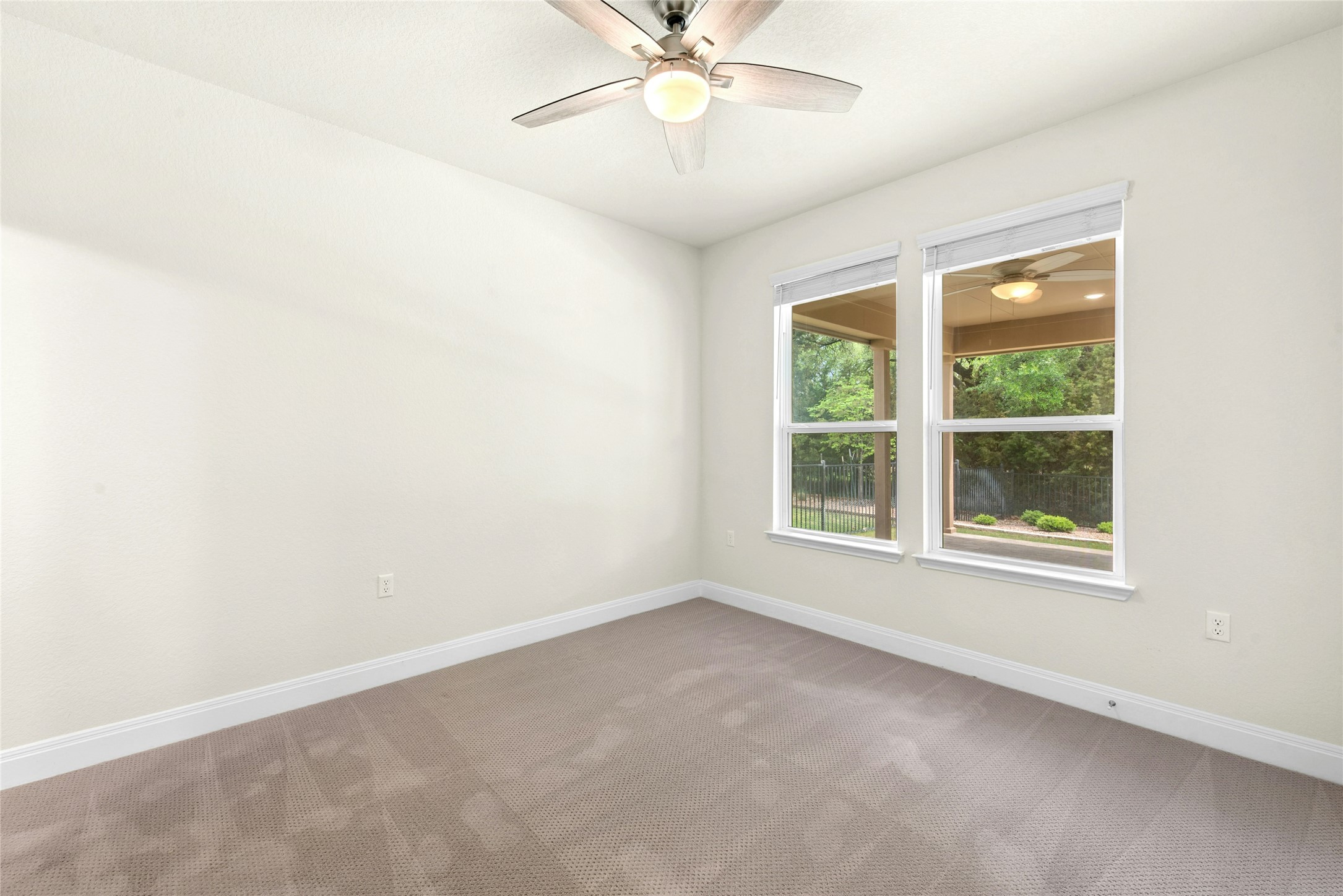 105 Marfa Cove Georgetown, TX 78633 - Photo 22 of 36 an empty room with a window and a fan