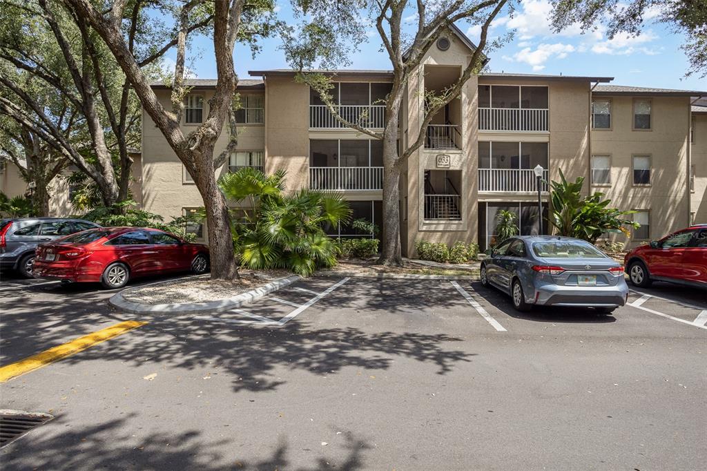 633 Buoy Lane, Unit 104 Altamonte Springs, FL 32714 - Photo 1 of 16 a car parked in front of a building