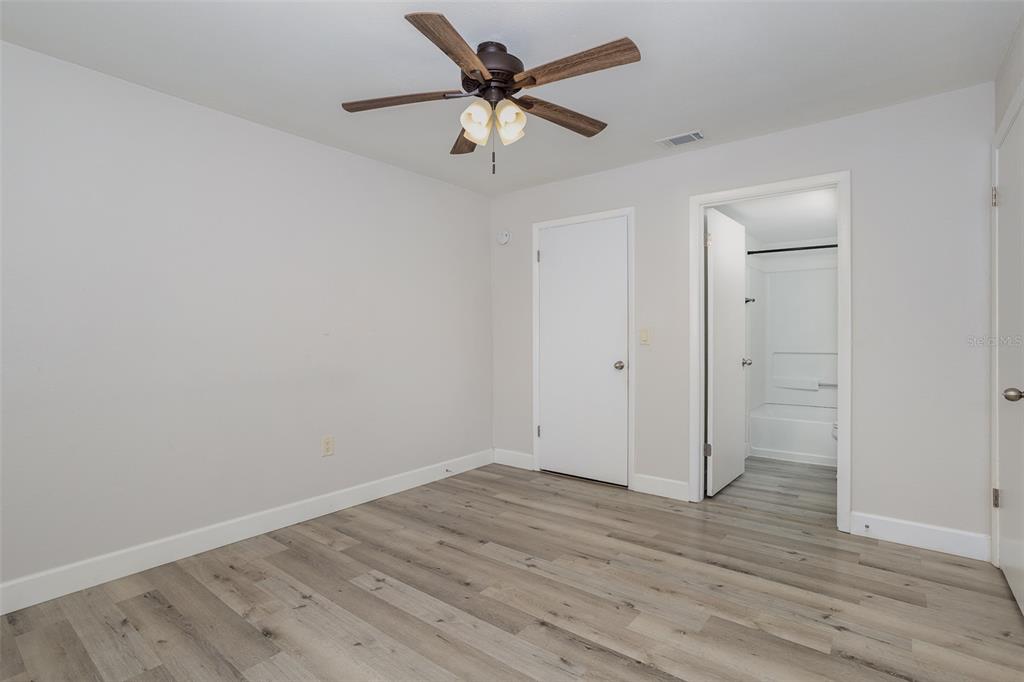 633 Buoy Lane, Unit 104 Altamonte Springs, FL 32714 - Photo 9 of 16 wooden floor in an empty room