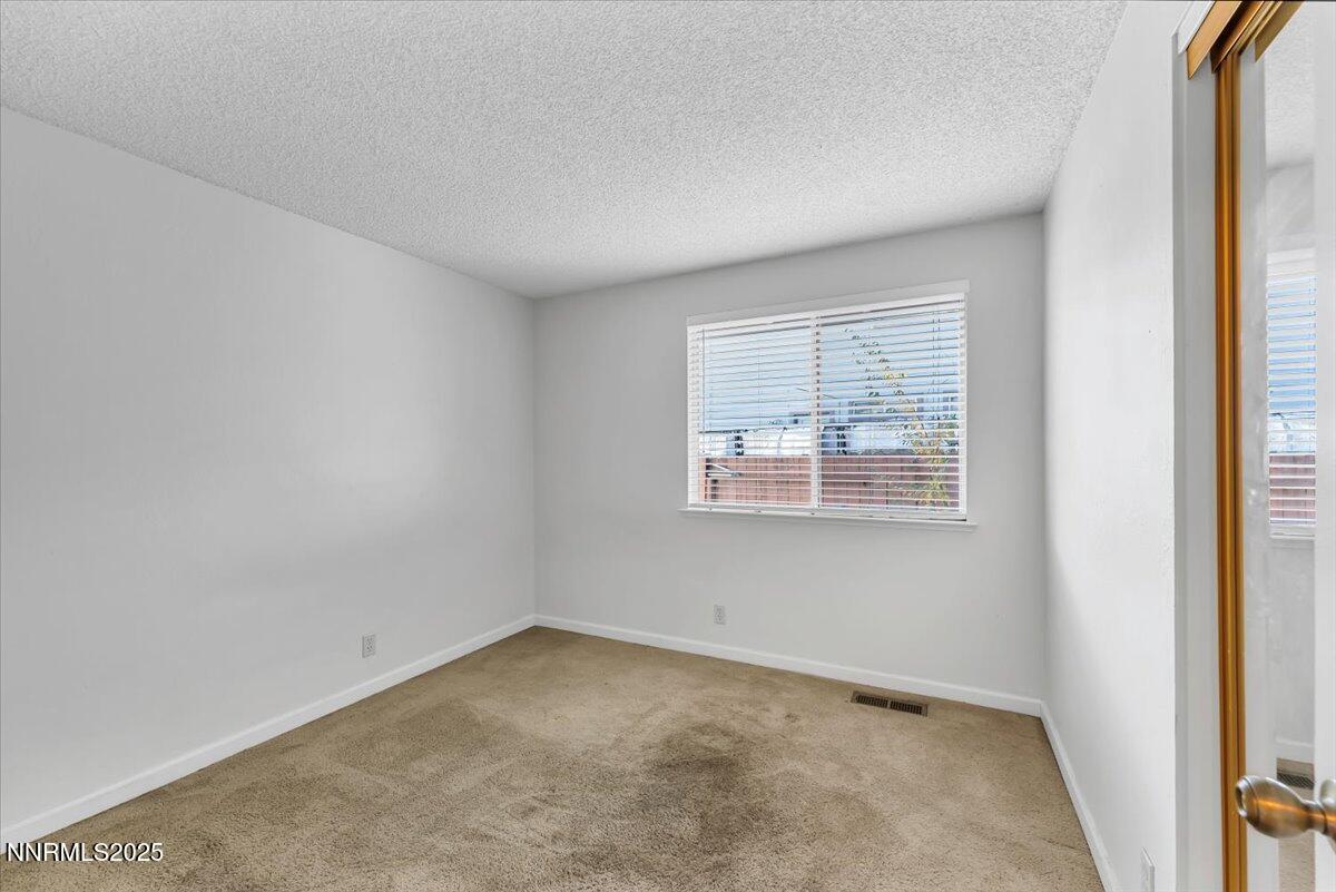 4434 Whitney Circle Sparks, NV 89436 - Photo 23 of 32 an empty room with a window