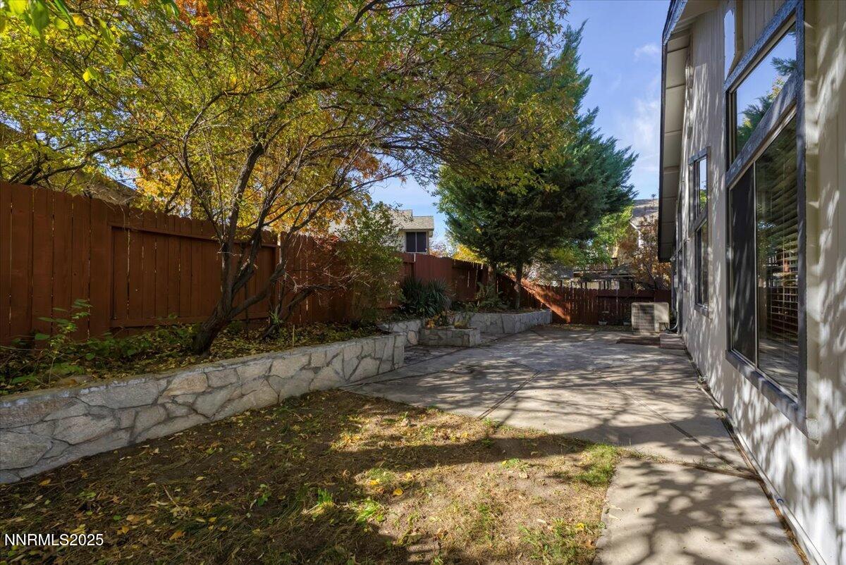 4434 Whitney Circle Sparks, NV 89436 - Photo 31 of 32 a view of a yard with plants and trees