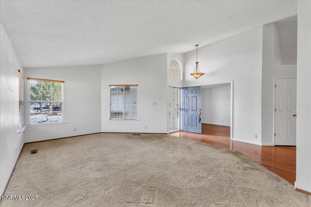 4434 Whitney Circle Sparks, NV 89436 - Photo 9 of 32 a view of an empty room with a window